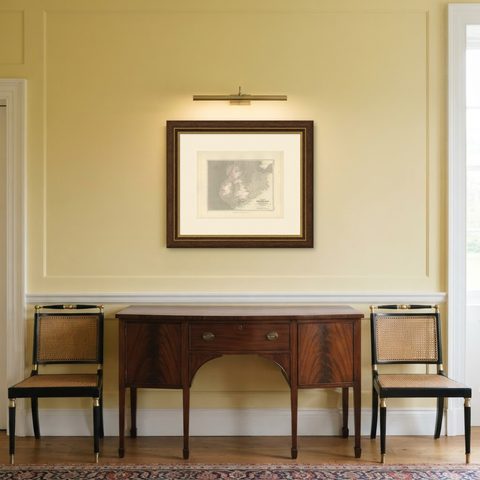 Antique Tidal Chart of the British Seas by Johnston, '1850', shown framed in a room