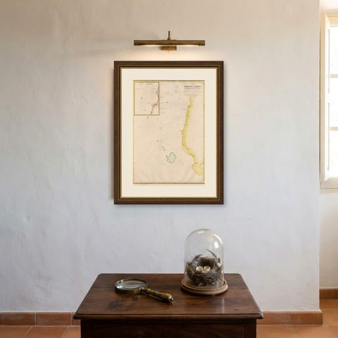 Large Antique Map of the west coast of Celebes, Sulawesi, Indonesia, shown framed on a wall