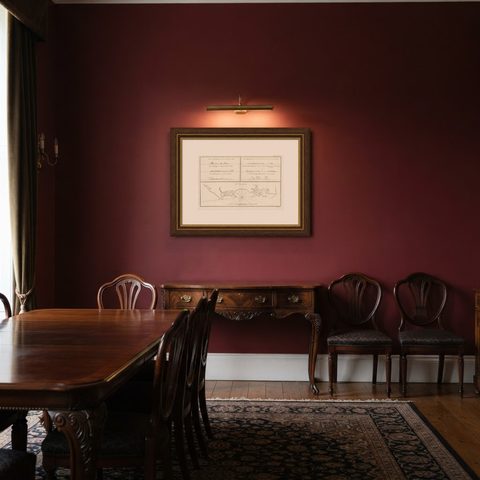 Antique Map of New Ireland (Pacific) with Coastal Profiles, Cook Voyages, 1774, shown framed in a room