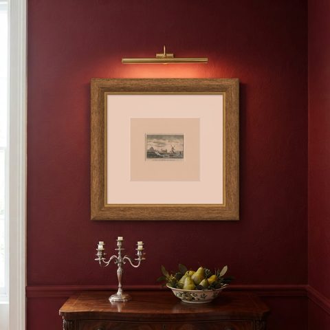 Antique Print of a Harbor Near the Amstel River in Amsterdam, c.1730, shown framed on a wall