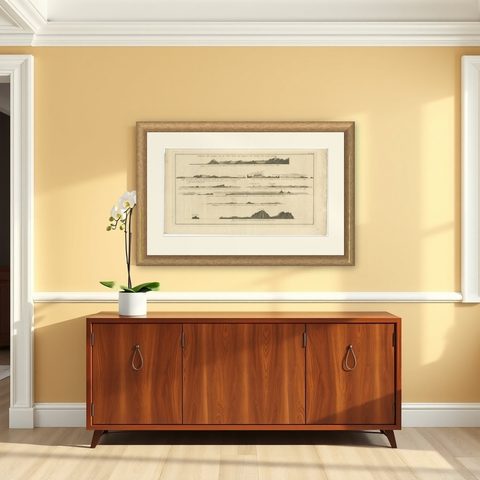 Antique Print with Coastal Views of Islands Near The American Coast by Cook, shown framed on a wall