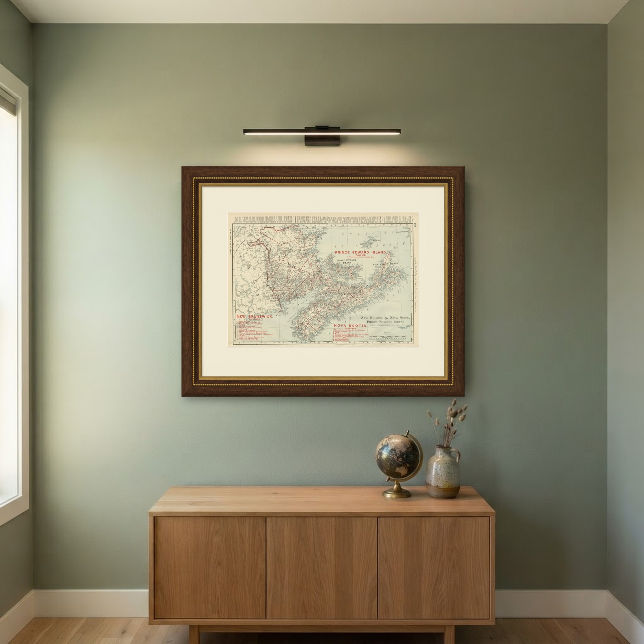 Antique Maritimes Map, New Brunswick, Nova Scotia and Prince Edward Island, 1899, shown framed on a wall
