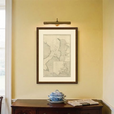 Antique Map of the British Islands to the White Sea by J. Imray, shown framed on a wall