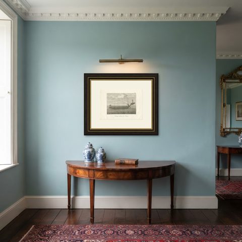 Antique Print of a Burmese War Boat by Symes '1800', shown framed in a room