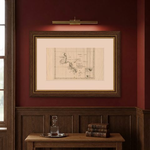 Antique Map of the Coast of Kerguelens Island by Cook, 1803, shown framed on a wall