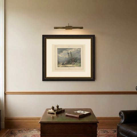 1835 Hand-Colored Lithograph: Stranded Ship in Winter Landscape, shown framed on a wall