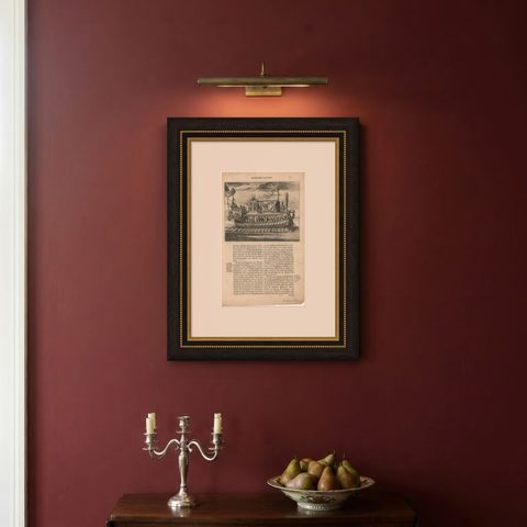Antique Print of a Japanese Pleasure Yacht by Montanus, 1669, shown framed on a wall