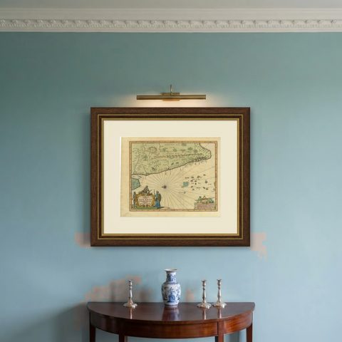 Antique Map of the Malabar Coast by Baldaeus, 1744, shown framed on a wall