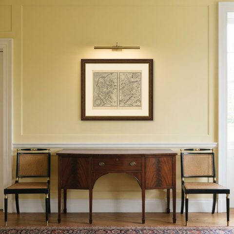 Antique Map of the Coastline Between Calais and Estaples and Northern France, shown framed in a room