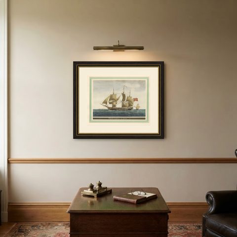 Before the Gales: An English Frigate Awaiting Wind, circa 1920, shown framed on a wall