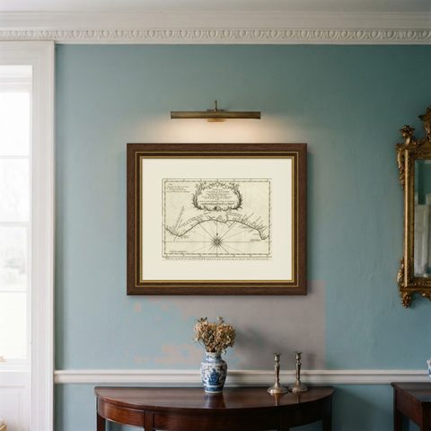 Antique Map of the Coast of Guinea from, Cape Apollonia to the Volta River, shown framed on a wall