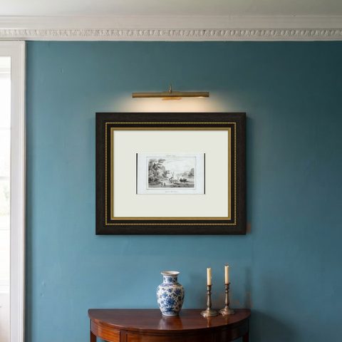 Antique Print of Sailors at New Ireland, 1836, shown framed on a wall