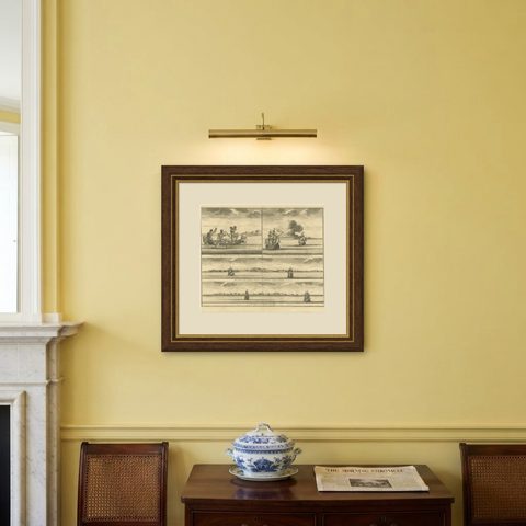Old Print of VOC Ships & Native Fisherman and Coastal Views of New Guinea, 1726, shown framed on a wall